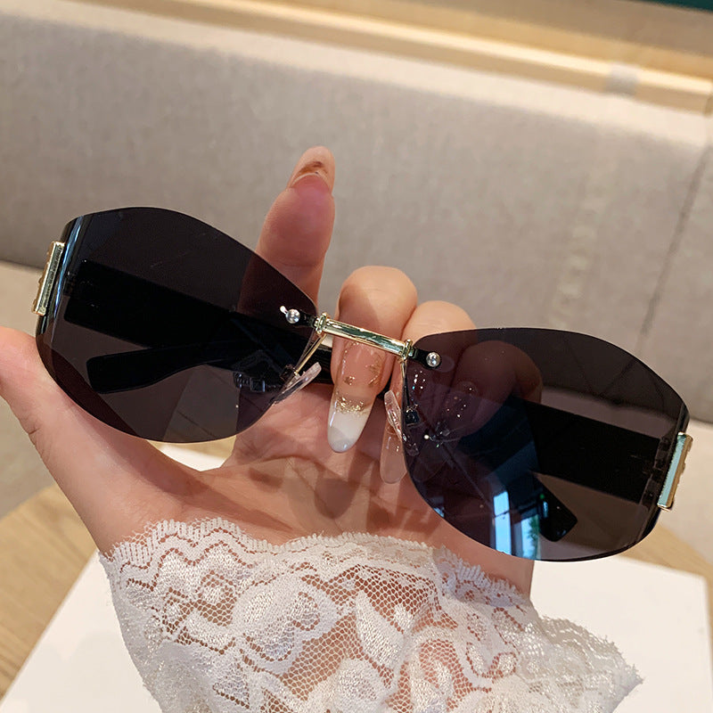 Wholesale Retro rimless oval curved lens sunglasses